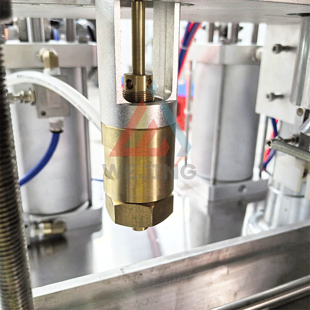 Sistema de llenado de m&aacute;quina llenadora de aerosoles.